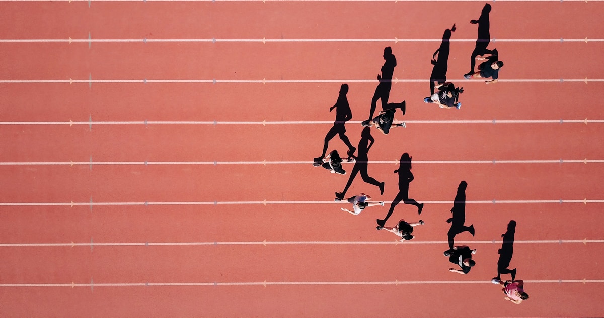 Group of runners on an athletics track at a stadium